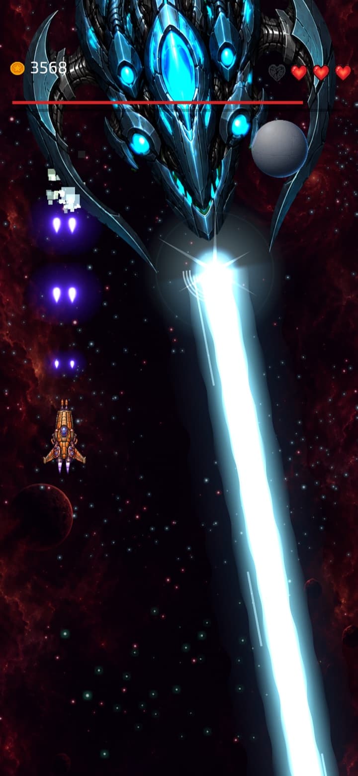 A boss firing a huge cyan beam across the screen